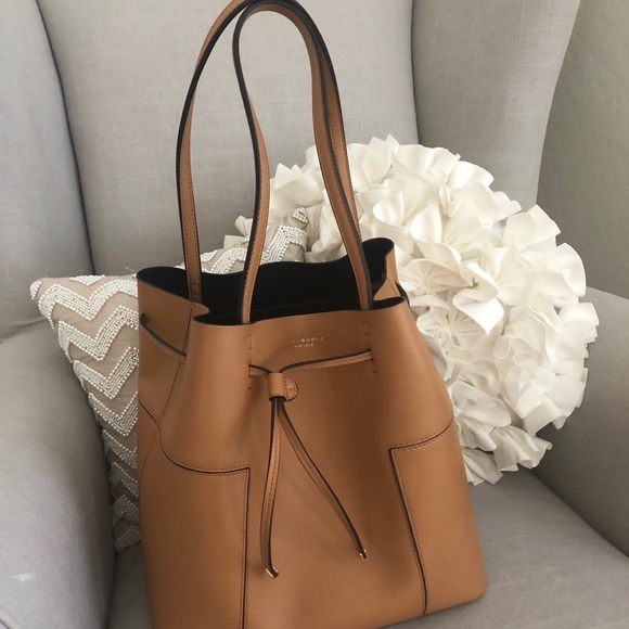 Tory Burch Handbags - Firm Tory Burch “T” leather bucket tote